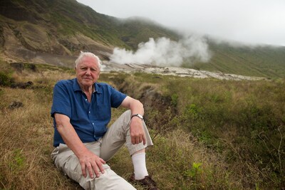 Sir David Attenborough with a fumerole on Alcedo volcano. From Galapagos 3D with David Attenborough (2013). Credit: Robert Hollingworth / © Colossus Productions